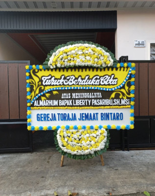 Papan Bunga Duka di Kima Atas