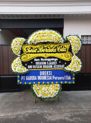 Papan Bunga Duka di Kima Atas
